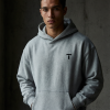 TOPEDGE Essential Hoodie — worn by model, heather grey oversized fit